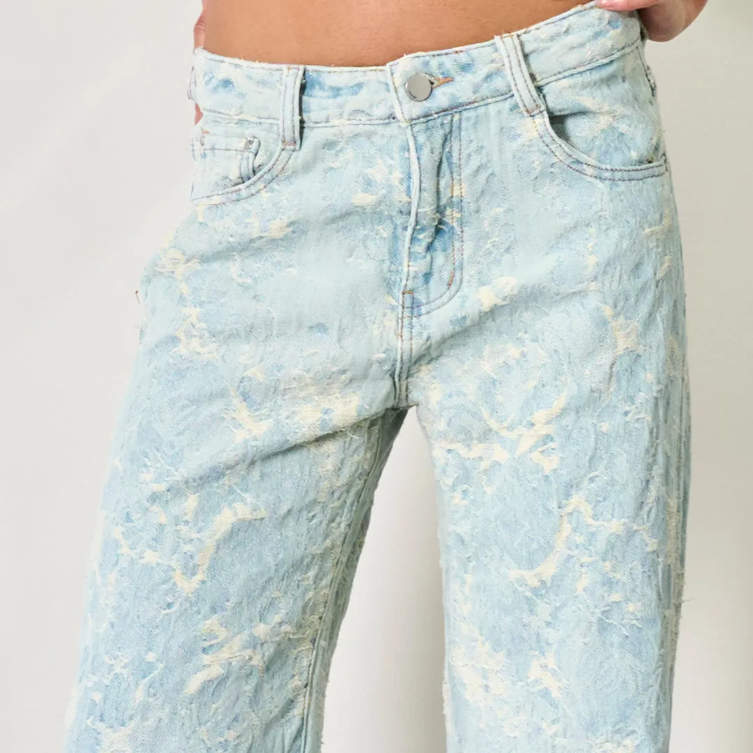 Textured distressed denim jeans wholesale