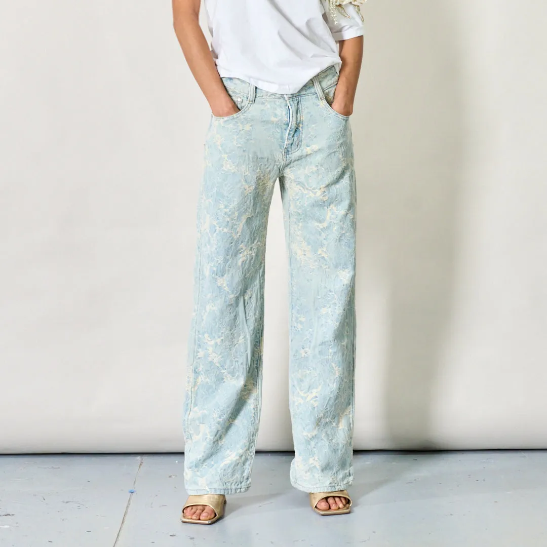 Textured distressed denim jeans wholesale